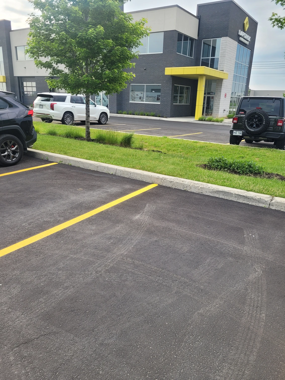 A concrete curb parking lot outside one of our construction transformations.