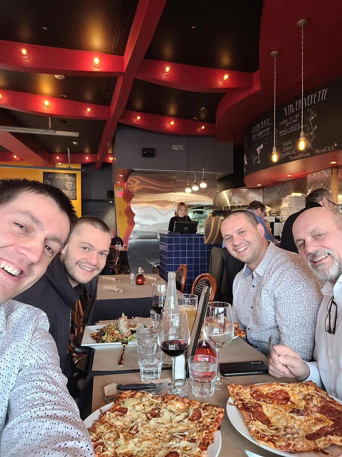 Francis Létourneau and his three sons eating lunch.