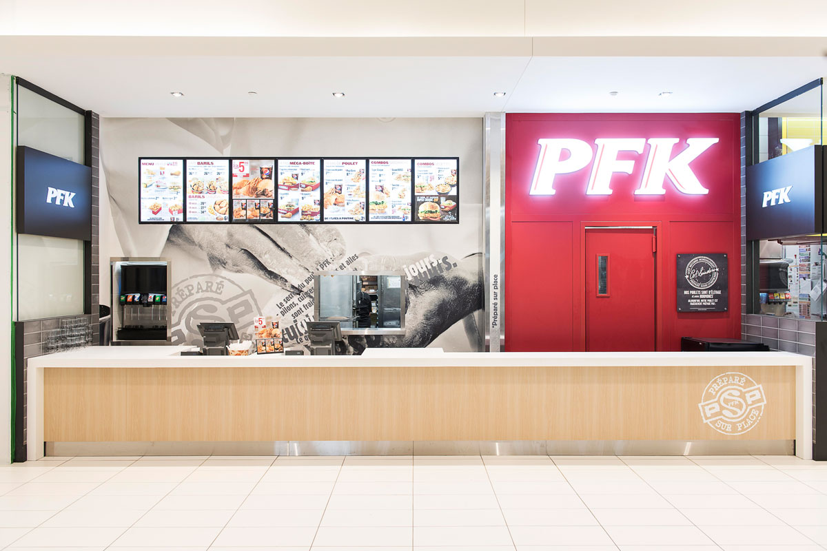 The facade of the KFC food stand in Quebec post-transformation by our general contractor and interior designers.